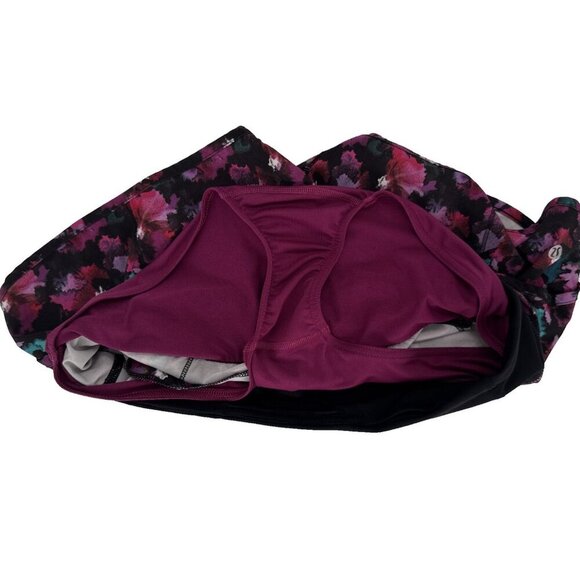 Lululemon Speed Short 8 Mini Midnight Bloom Black Deep Fuschia woman running - Picture 5 of 7